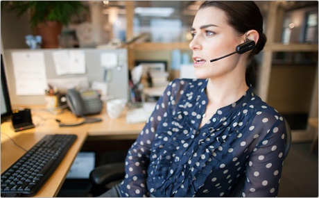Women Using Plantronics Headset Women Using Plantronics Headset
