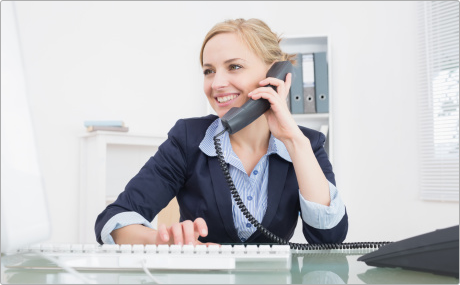 Women Using a Polycom Business Phonef Women Using a Polycom Business Phone